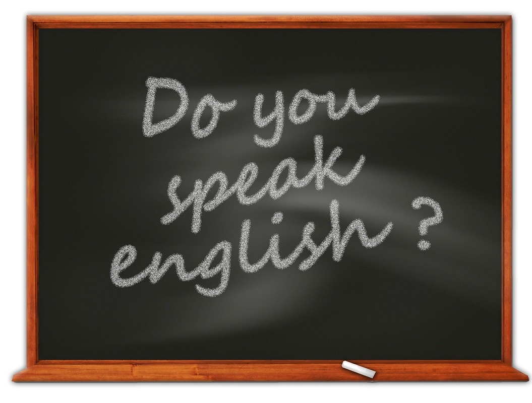 Written on chalkboard Do you speak English?